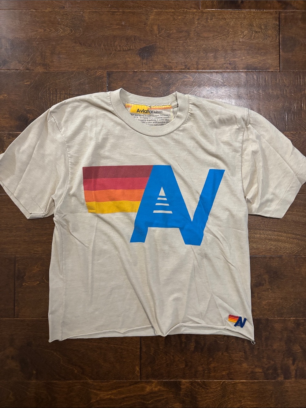 Aviator Nation Cream Short-Sleeve Tee with Blue 'A' Logo and Rainbow Stripes